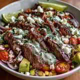 Sizzling, charred corn kernels and creamy avocado add texture to this hearty dinner.