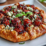 Golden Roasted Cherry Tomato and Feta Galette, a rustic beauty ready for tart lovers.